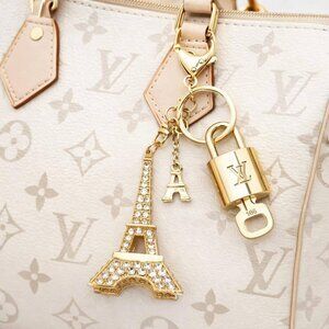 Authentic Louis Vuitton Lock & Key with unbranded Bagcharm, Keycharm